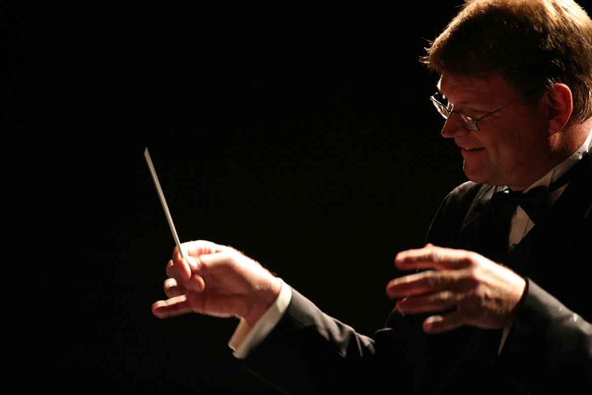 Frank Troyka conducting a band.